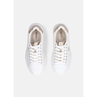 Vista superior con interior acolchado y lengüeta dorada.