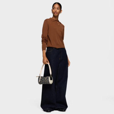 Bolso uso diario negro mujer TOUS modelo llevándolo en mano