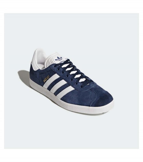 Zapatillas Adidas Gazelle en color Collegiate Navy, un ícono del estilo urbano.