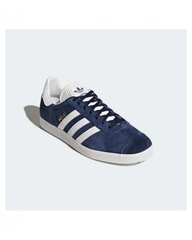 Zapatillas Adidas Gazelle en Collegiate Navy y detalles en blanco y dorado.