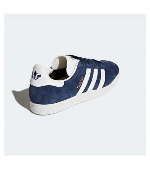 Zapatillas Adidas Gazelle en color Collegiate Navy, un ícono del estilo urbano.