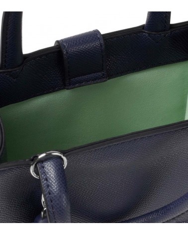 Material de Poliuretano Resistente del Mini Bolso TOUS – Durabilidad y diseño en perfecta armonía. Interior verde