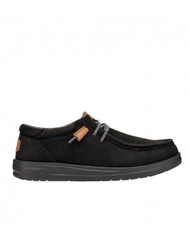 Vista lateral de los DUDE WALLY GRIP CRAFT LEATHER en negro, con suela de goma flexible.