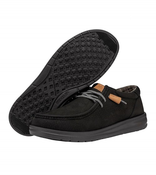 Vista lateral de los DUDE WALLY GRIP CRAFT LEATHER en negro, con suela de goma flexible.