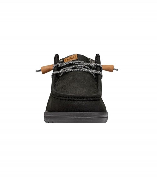 Vista lateral de los DUDE WALLY GRIP CRAFT LEATHER en negro, con suela de goma flexible.