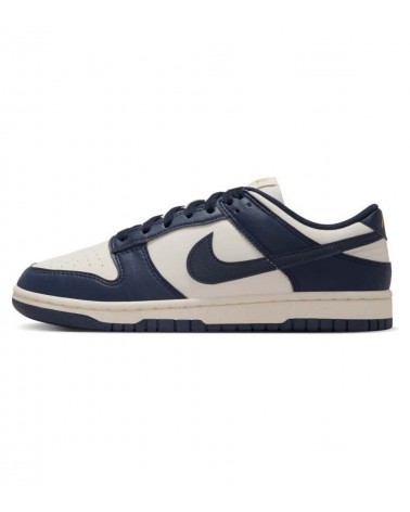 Nike Dunk Low en gris, perfectas para ocasiones casuales y deportivas.