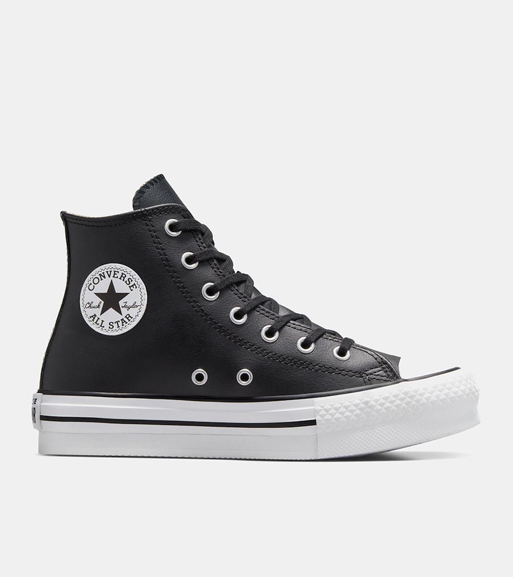 Converse Chuck Taylor All Star Lift Leather Alta Mujer Negro - Piel Detalle del icónico parche Chuck Taylor en el tobillo.