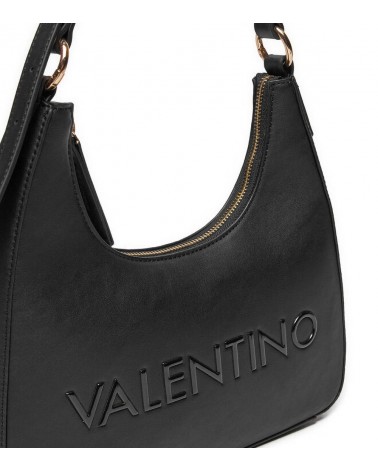 Detalle de los acabados del bolso Valentino con cremallera dorada.