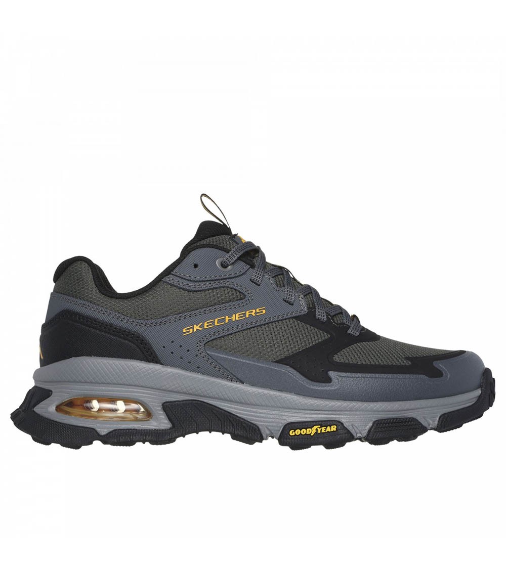 Vista lateral Skechers Hombre Deportivo Trekking con suela Goodyear®.