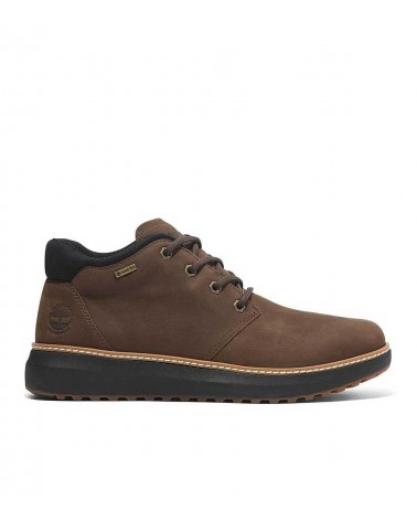 Vista lateral de las botas Timberland Hudson Road Mid Lace Up Chukka en marrón oscuro.