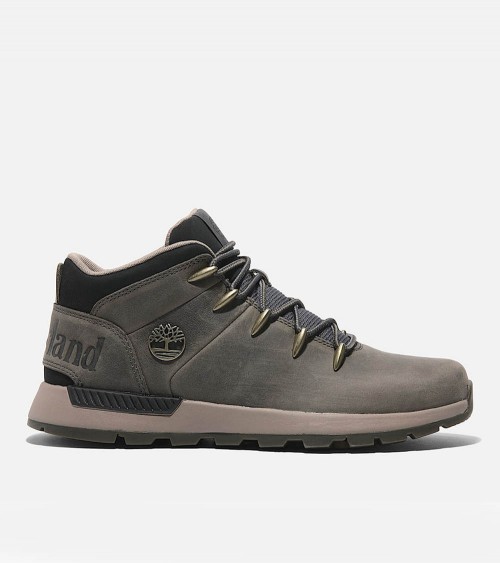 Vista frontal de las zapatillas Timberland Sprint Trekker en gris con cuero premium.