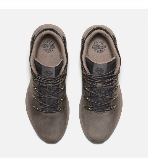 Vista frontal de las zapatillas Timberland Sprint Trekker en gris con cuero premium.